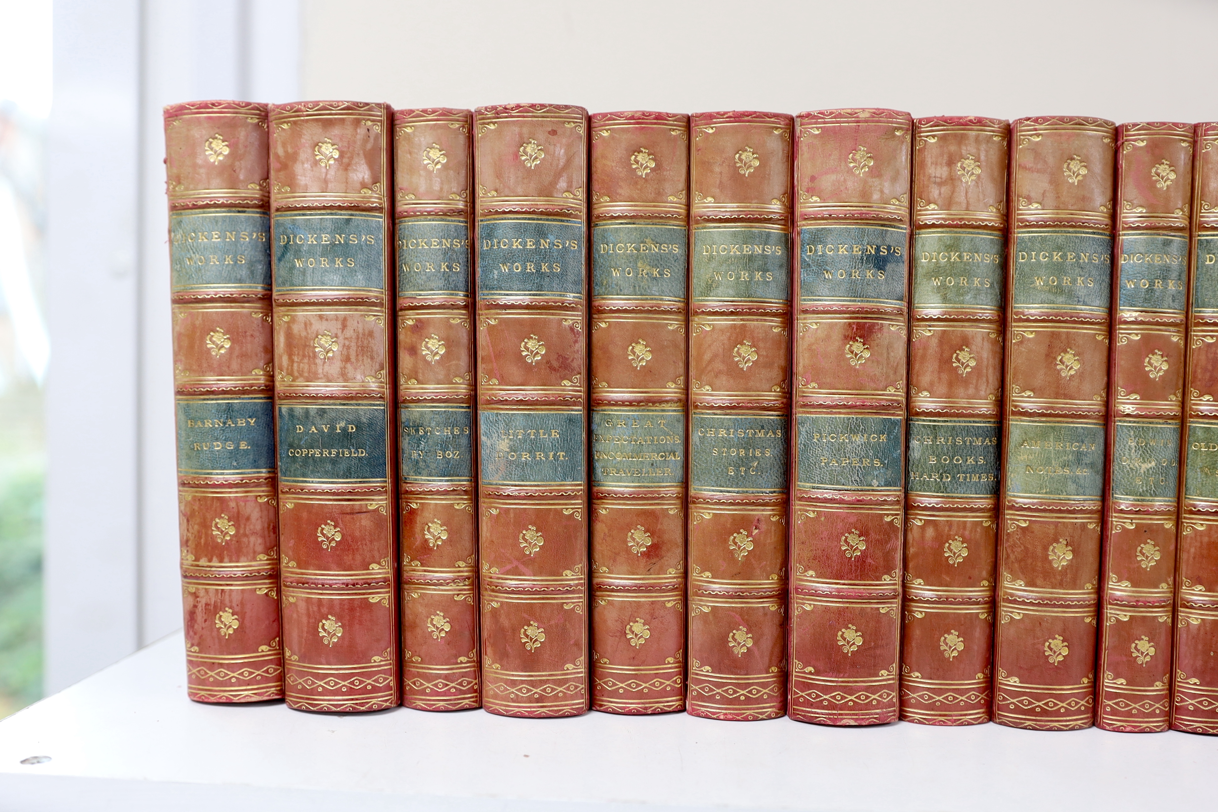 Dickens, Charles - (Collected Edition), 17 vols. some with additional engraved pictorial titles, many plates (the original illustrations); contemp. red half calf and marbled boards, gilt decorated panelled spines with gr